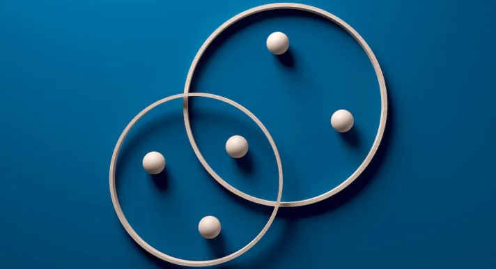 Een bedrijfsovername lijkt veel op de bedrijfsversie van een sprookjeshuwelijk, maar dan met meer advocaten en spreadsheets.