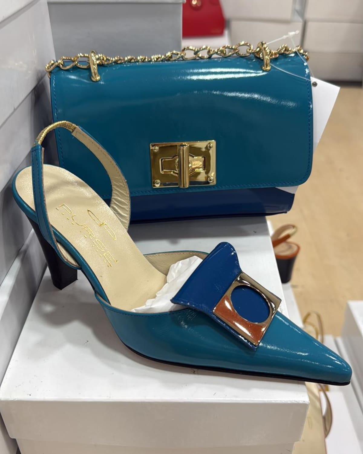 Assorted Women's Heels, Flats, and Men's Suits - three-quarter