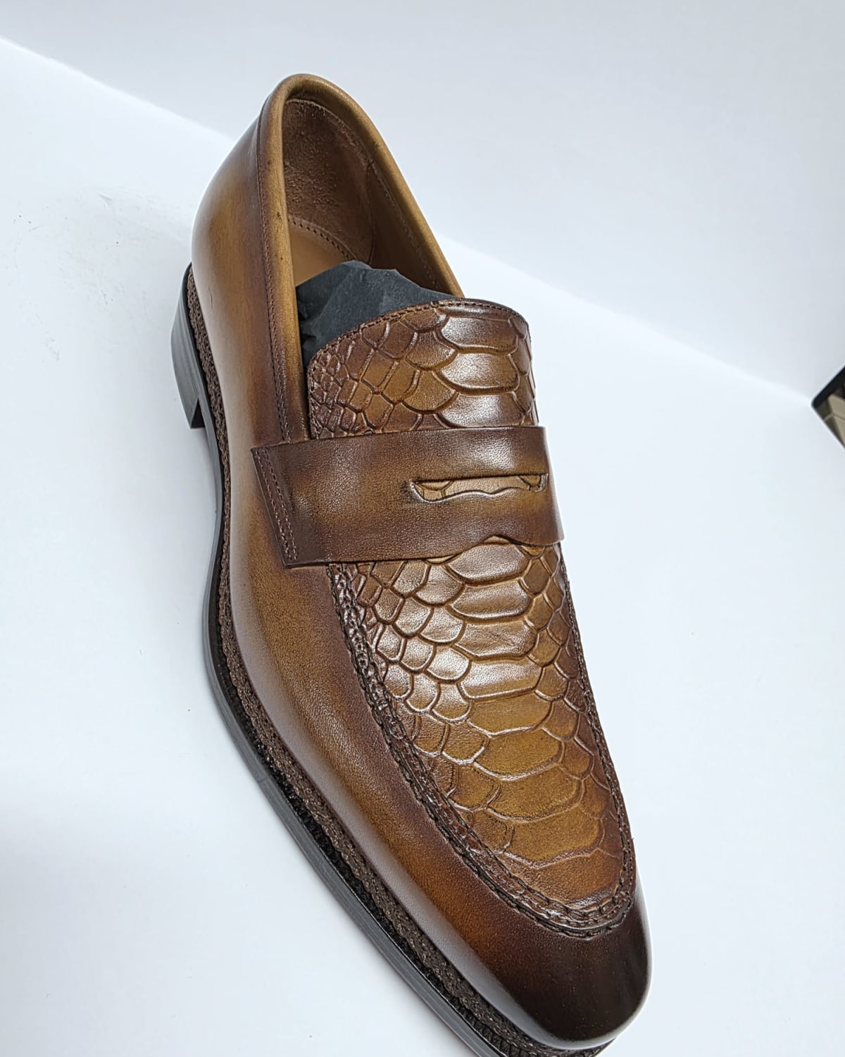 Brown Penny Loafer with Embossed Vamp - three-quarter