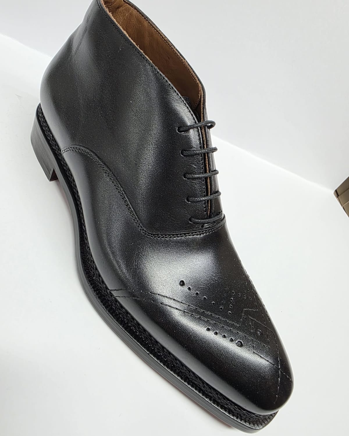 Black Leather Brogue Chukka Boot - three-quarter