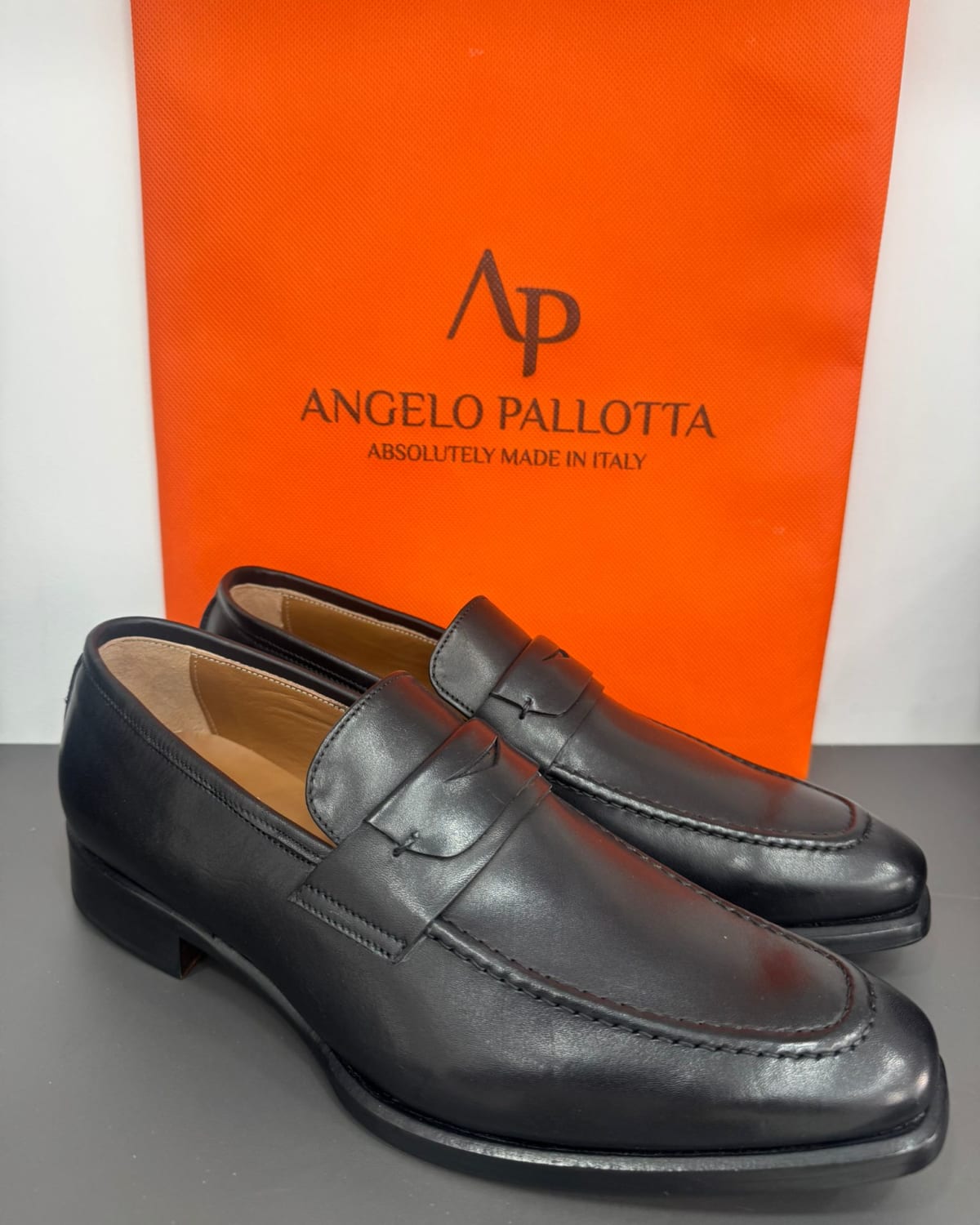 Black Leather Penny Loafers - three-quarter