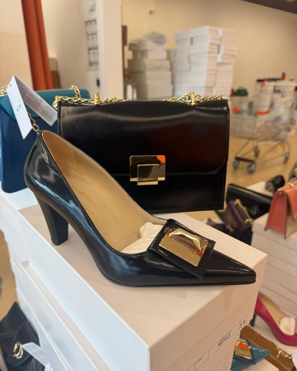 Assorted Women's Heels, Flats, and Men's Suits