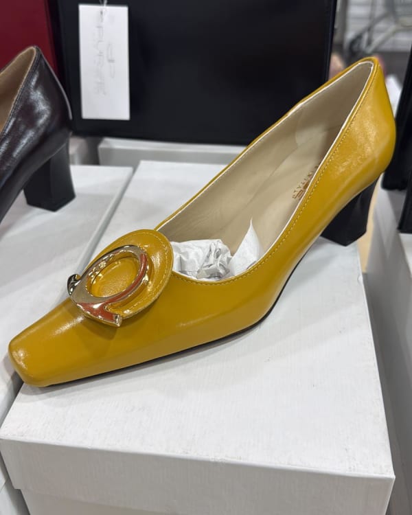 Assorted Women's Heels, Flats, and Men's Suits
