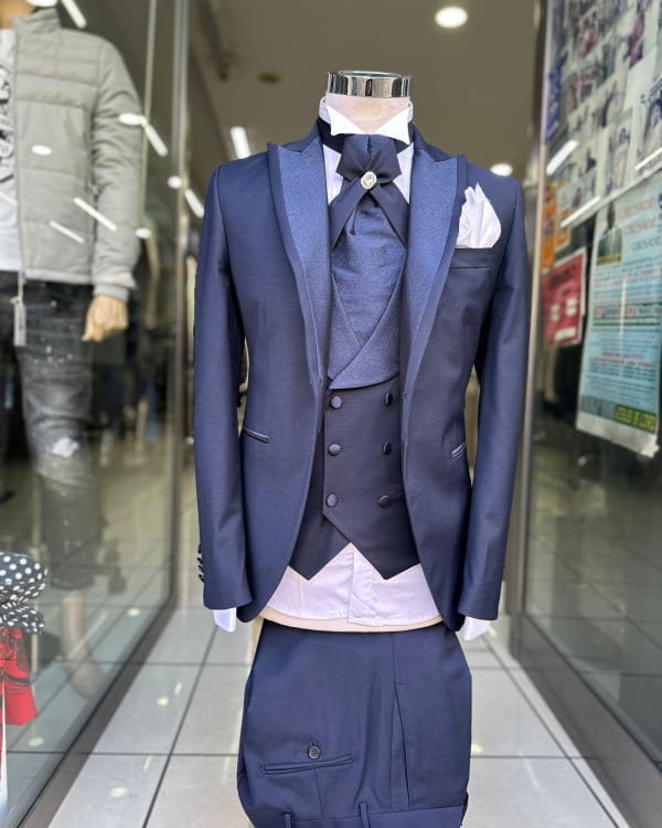 Assorted Women's Heels, Flats, and Men's Suits