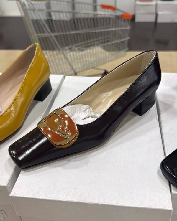 Assorted Women's Heels, Flats, and Men's Suits
