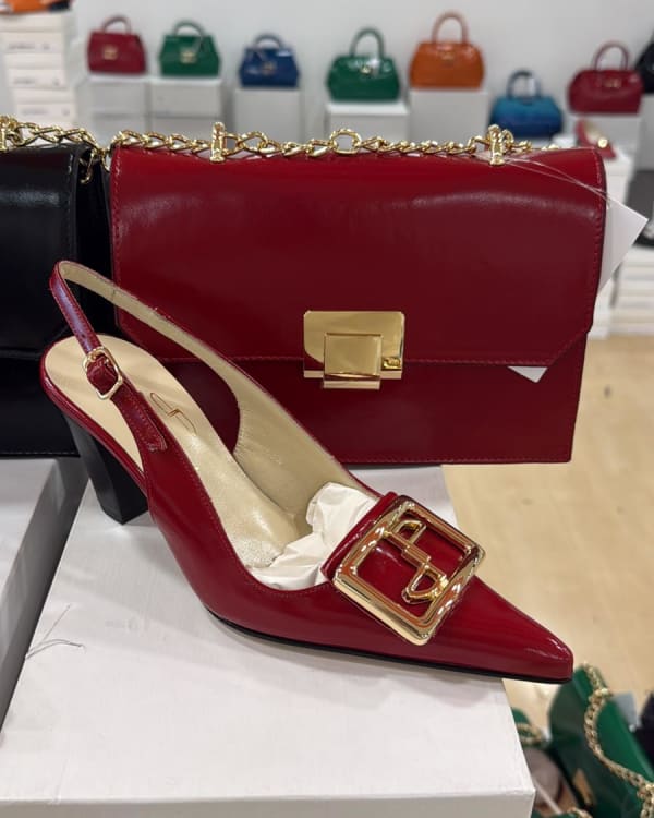 Assorted Women's Heels, Flats, and Men's Suits