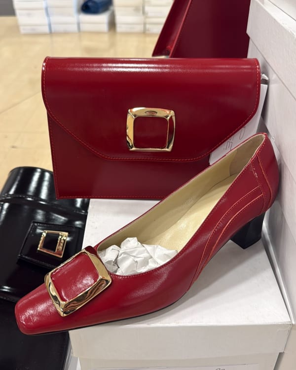 Assorted Women's Heels, Flats, and Men's Suits