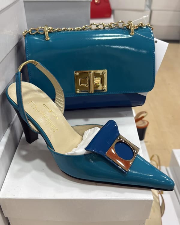 Assorted Women's Heels, Flats, and Men's Suits