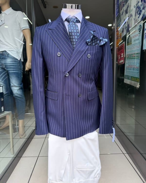 Assorted Women's Heels, Flats, and Men's Suits