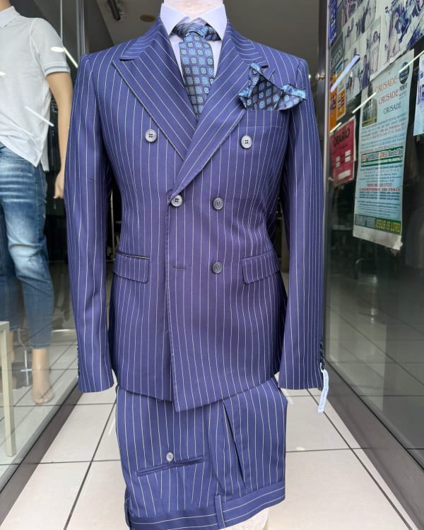 Assorted Women's Heels, Flats, and Men's Suits