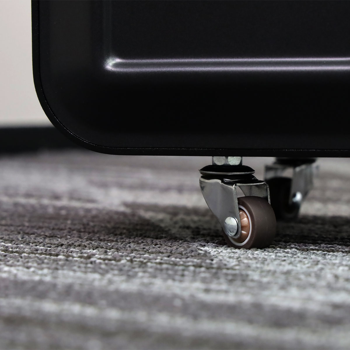 Close-up of one of the four swivel wheels on the base of the Revive Hydrogen generator