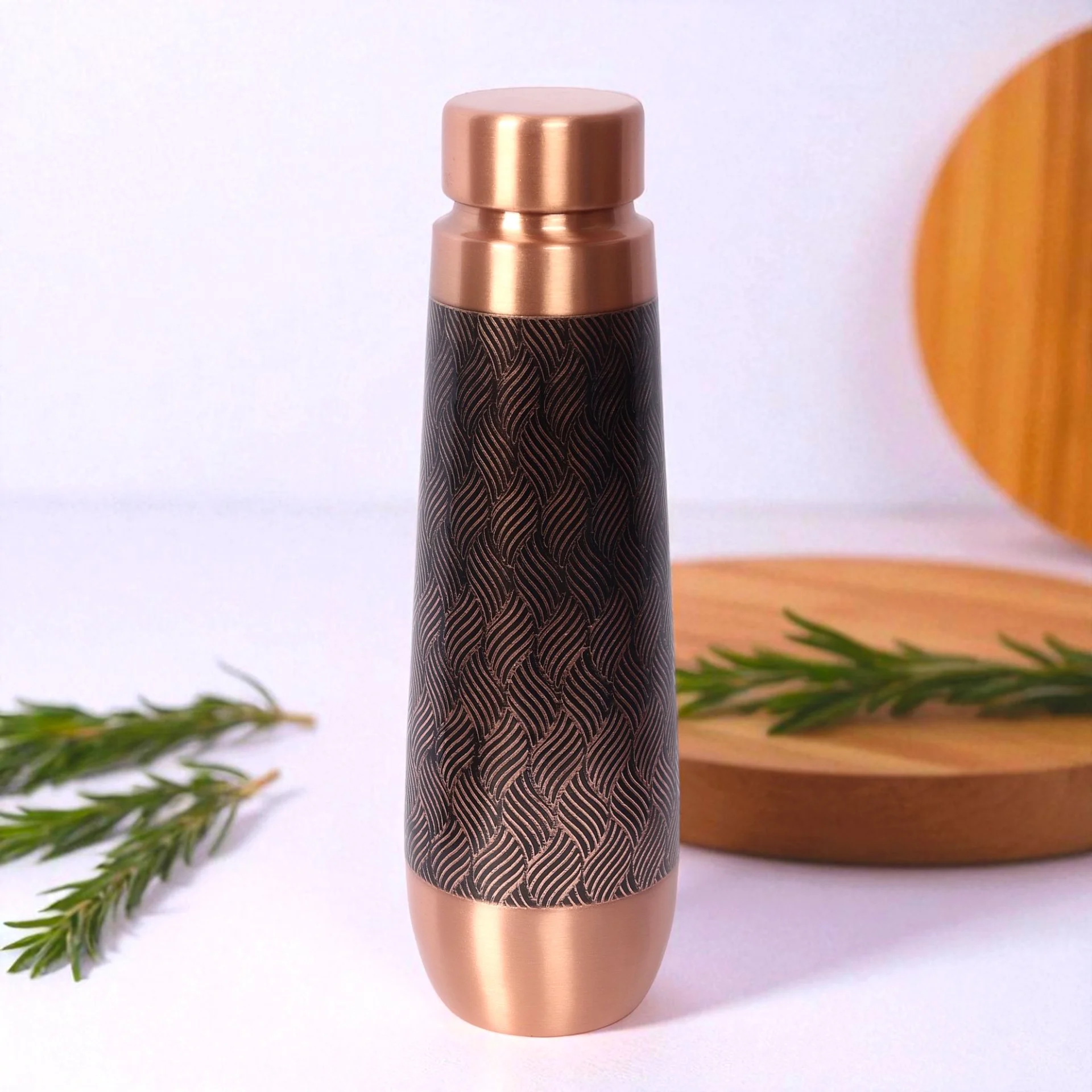 Elegant Copper Water Bottle with Intricate Weave Pattern