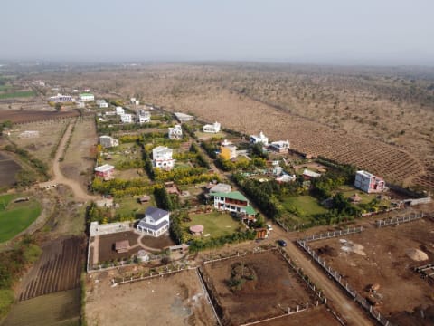 Premium managed farmland living just 30 km from Indore.