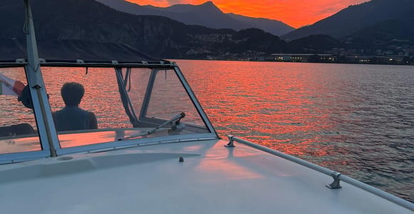 Sunset aperitif on a boat on Lake Iseo