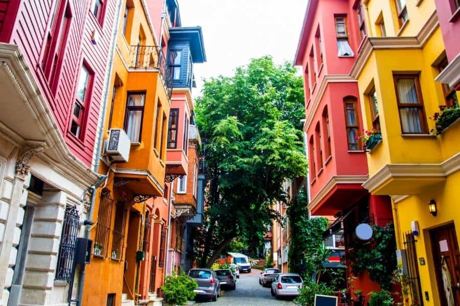 kuzguncuk colorful wooden houses with a tree at the street end