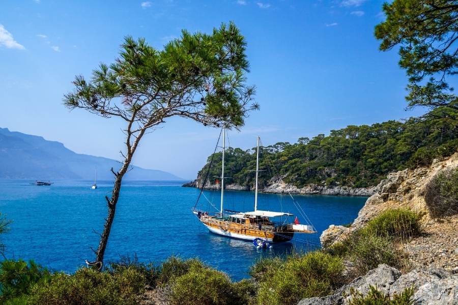 small cruise boat at a cove in fethiye