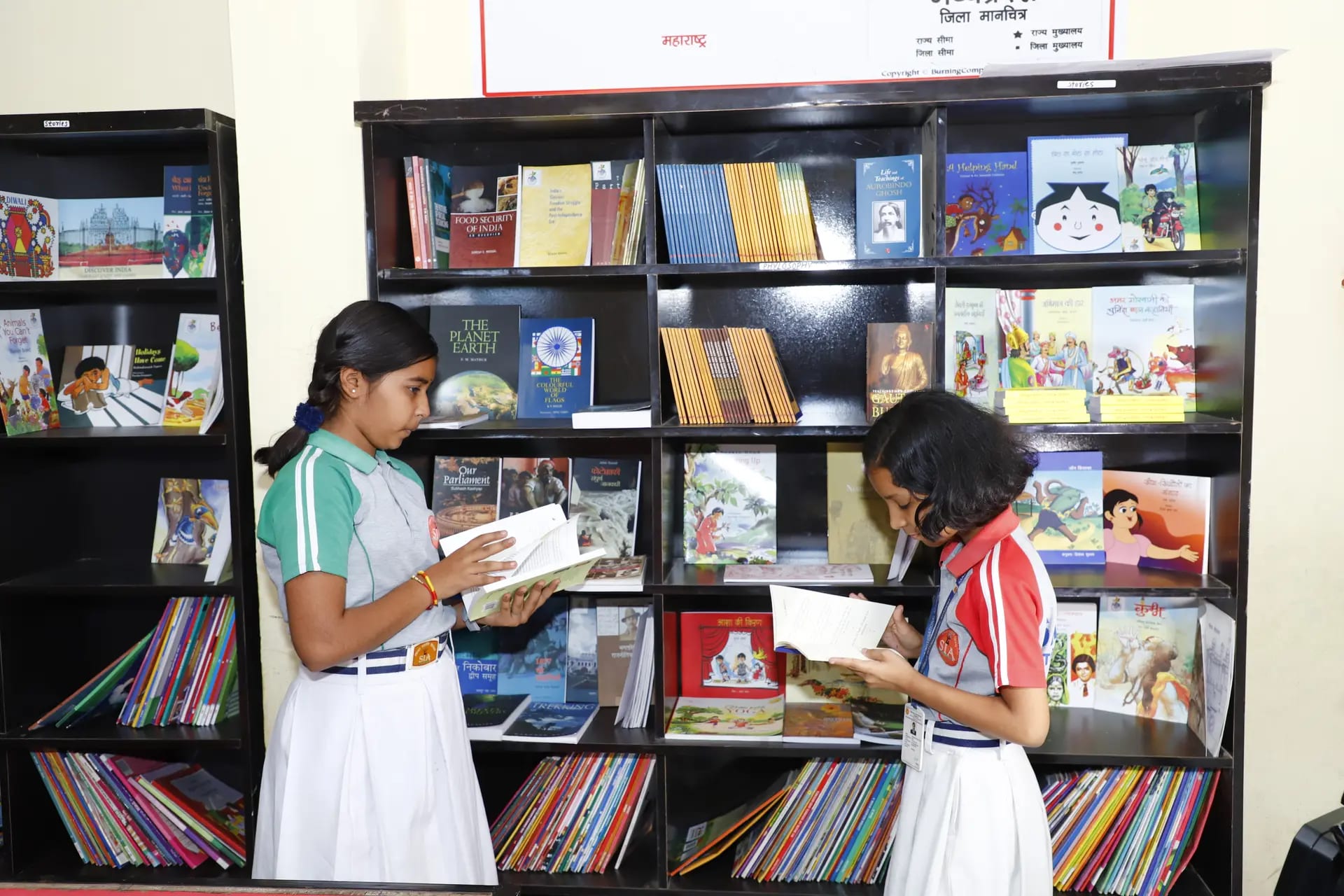 Students reading and studying in the school library