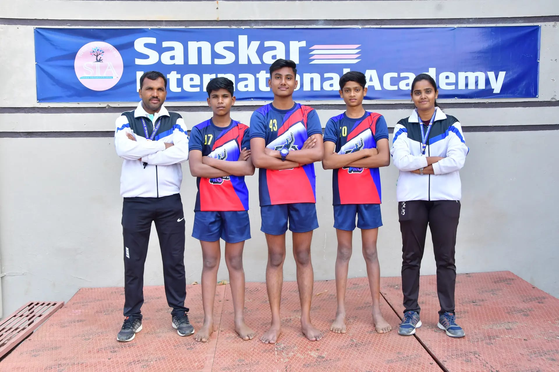 Students participating in sports activities on the playground