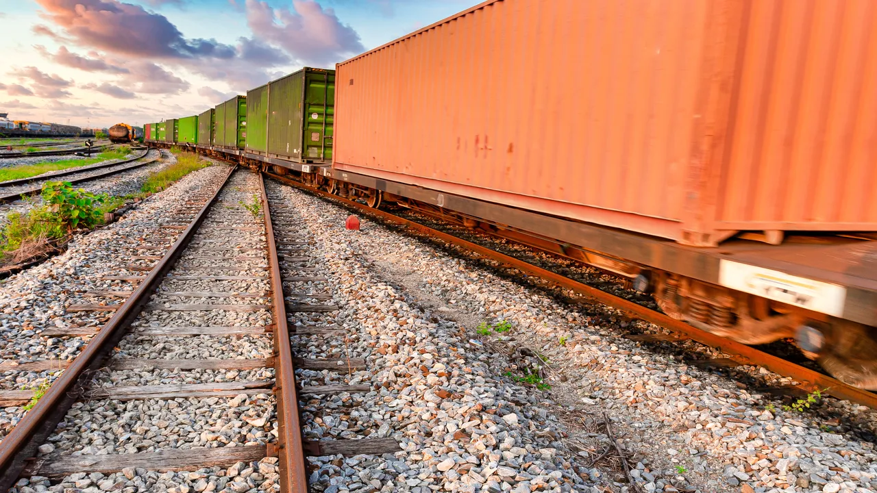 Container train that is moving out of the loading and unloading station to the port for export