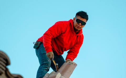 Roof Boyz crew inspecting a Phoenix metro roof before monsoon season