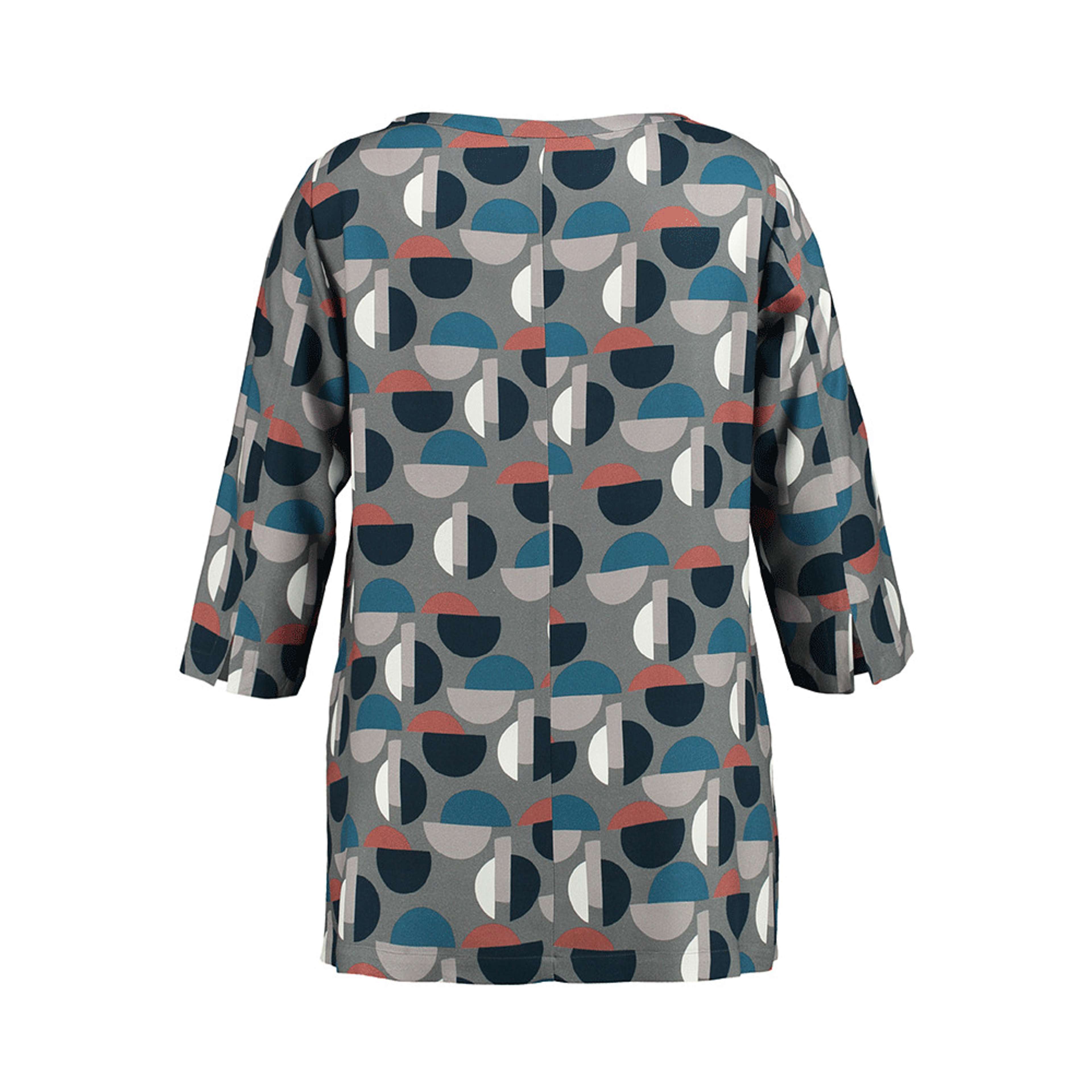 Blus med 3/4 lång ärm