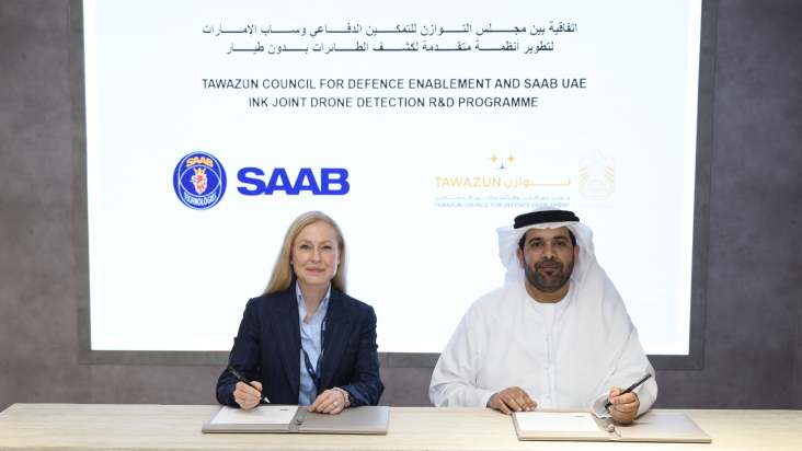 Matar Ali Al Romaithi, Director General of the Industry Development Directorate at the Tawazun Council for Defence Enablement and Heléne Bittmann, Managing Director of Saab UAE sign joint drone detection R&D programme at Dubai Air Show 2025