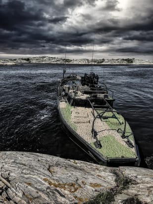 Combat boat with Barracuda Camouflage Marine Solution