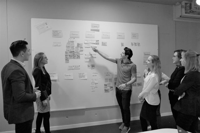 Team works together on the whiteboard