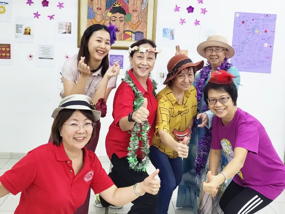 Newly certified Laughter Yoga leaders - Linda Tham, Chooi Peng Leong, and Hoang Thi Kim Chi. 