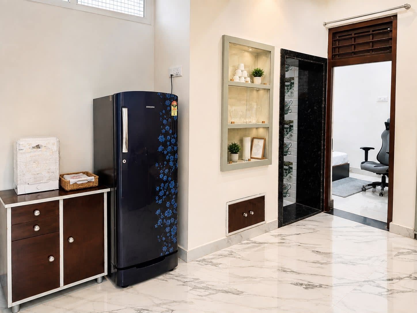 Dining / Lobby Hallway — Italian marble pattern flooring, Samsung refrigerator, illuminated showcase, RO water purifier