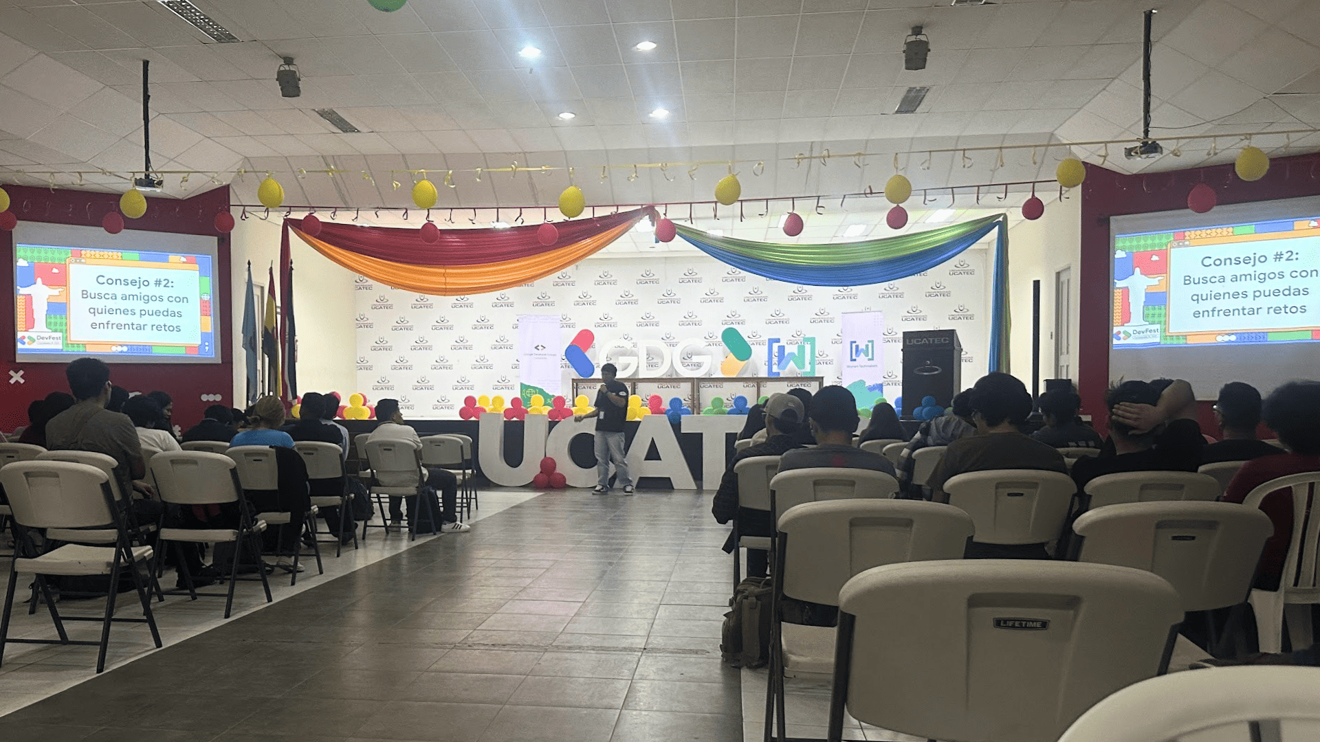 Pedro giving a talk at a GDG event