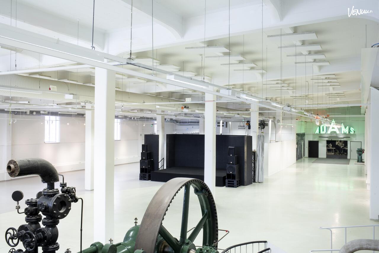 Energiasali &mdash; Industrial hall with vintage machinery and ADAMS sign