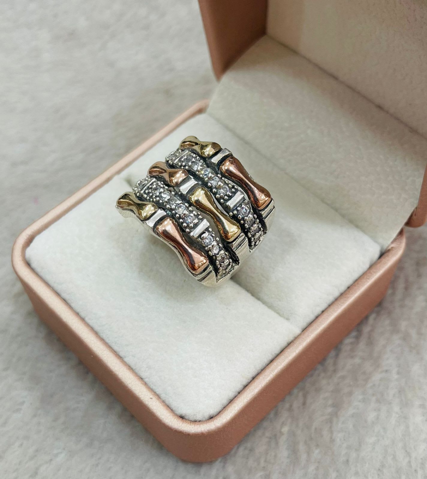 Anillo de Plata Forma Huesitos con Lámina Dorada