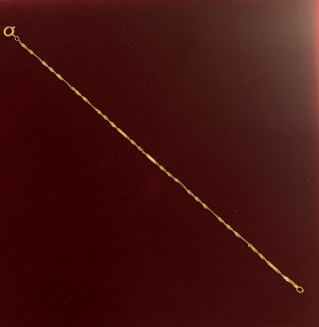 Pulsera Singapour Torzada de Oro 18k