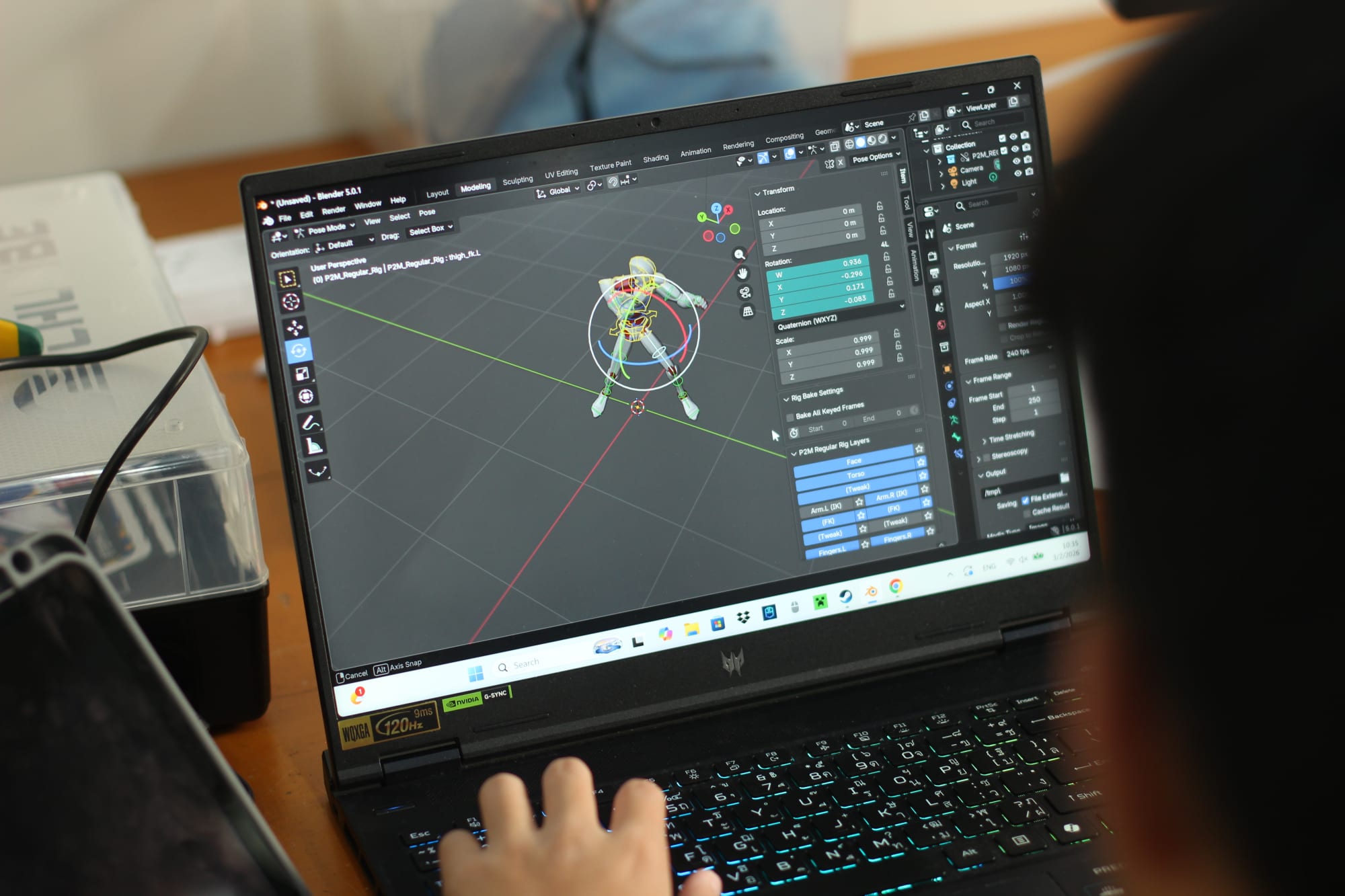 A learner rigging a 3D character model in Blender on a laptop