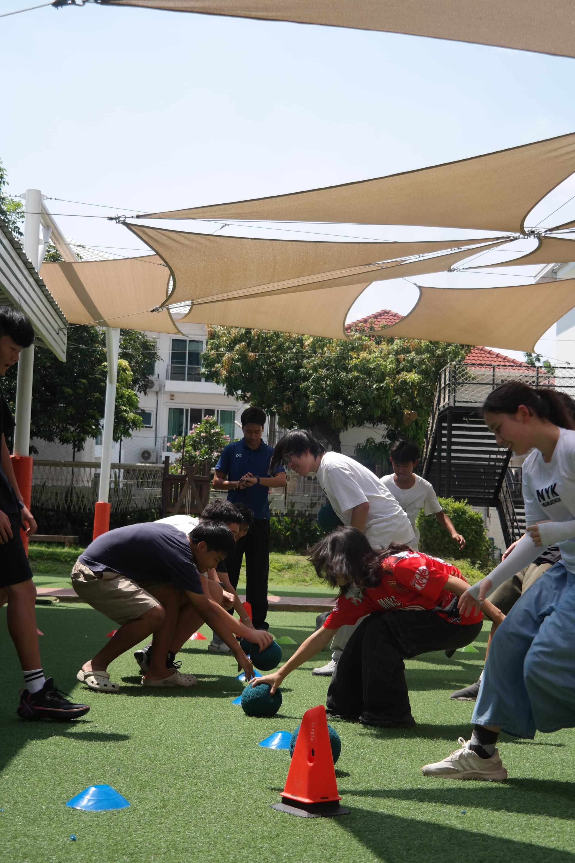 Students playing table tennis.