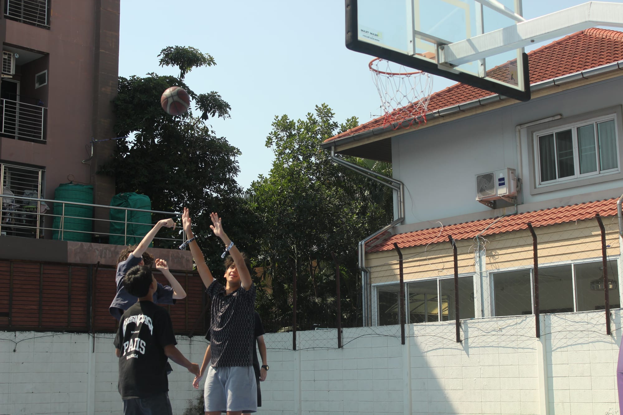 Students playing soccer.