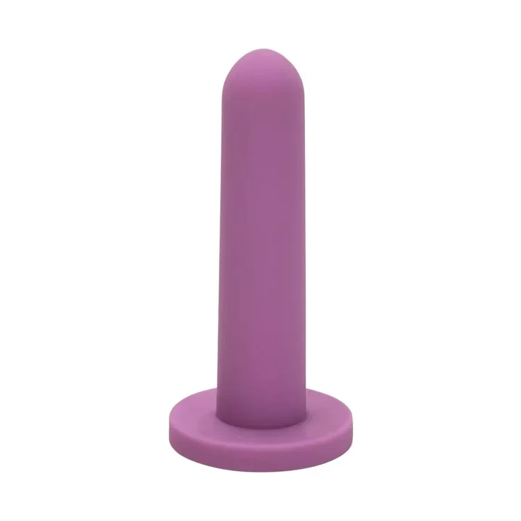 Close-up of a smooth medical grade silicone vaginal dilator with a rounded tip for gentle and comfortable vaginal dilator therapy.