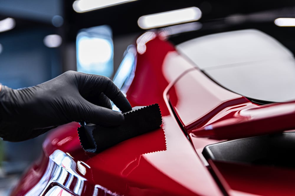 Technician applying detailing product