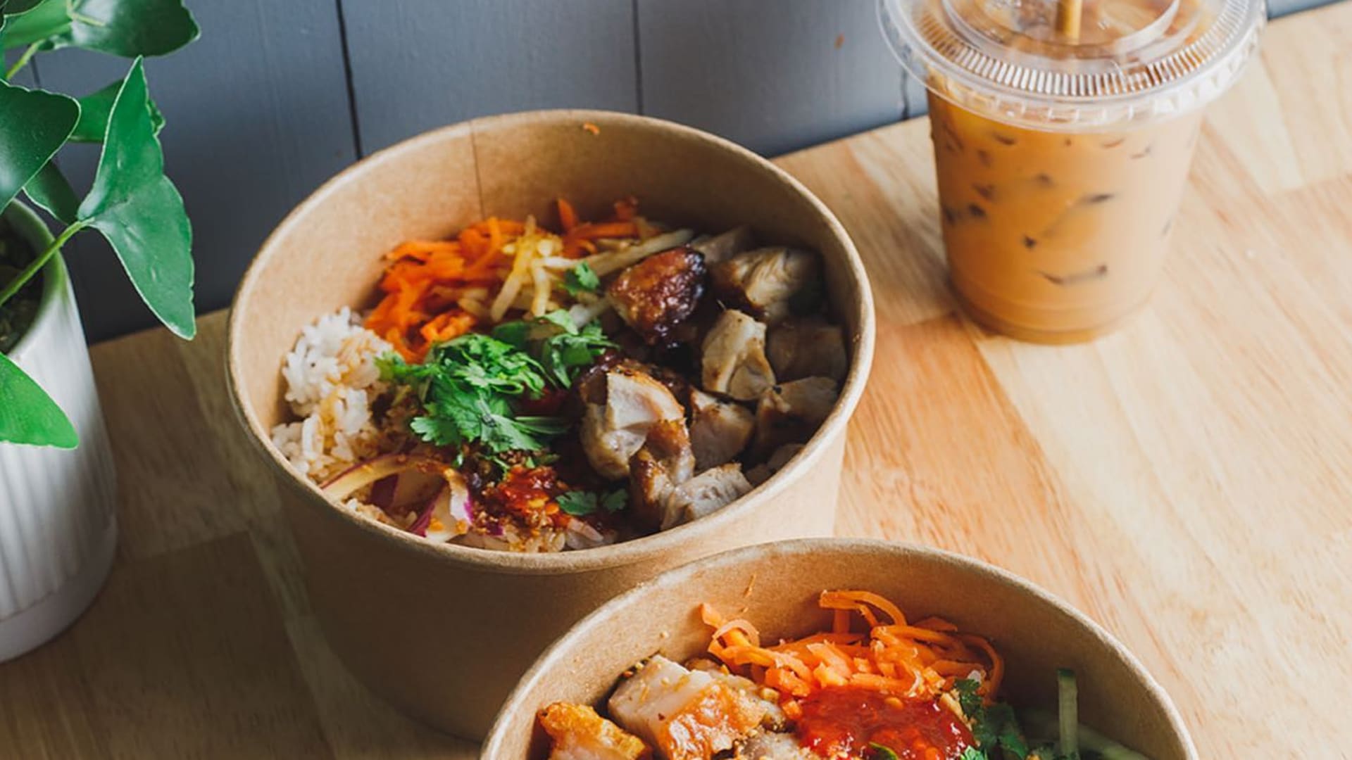 Bowls paired with Vietnamese iced coffee.