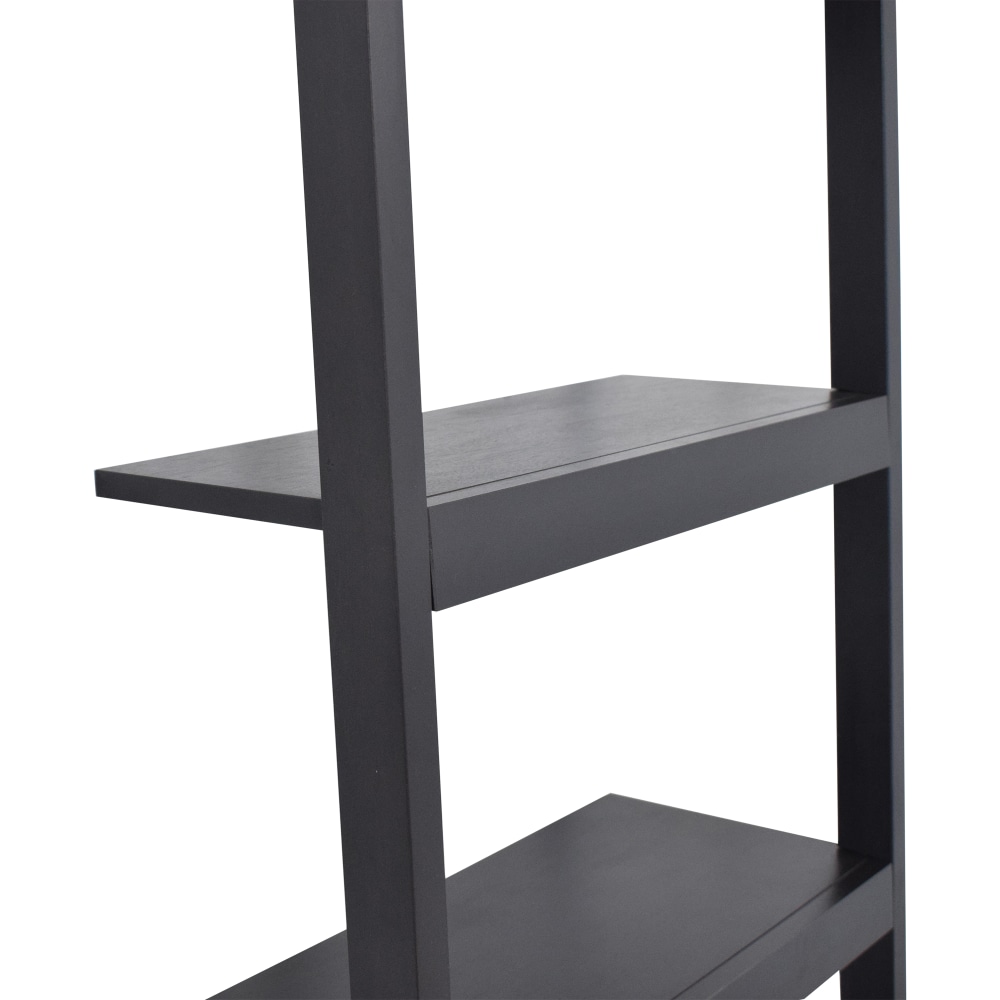 https://res.cloudinary.com/dkqtxtobb/image/upload/f_auto,q_auto:best,w_1000/product-assets/114989/crate-and-barrel/storage/bookcases-shelving/used-crate-and-barrel-sloane-black-leaning-bookshelf.jpeg