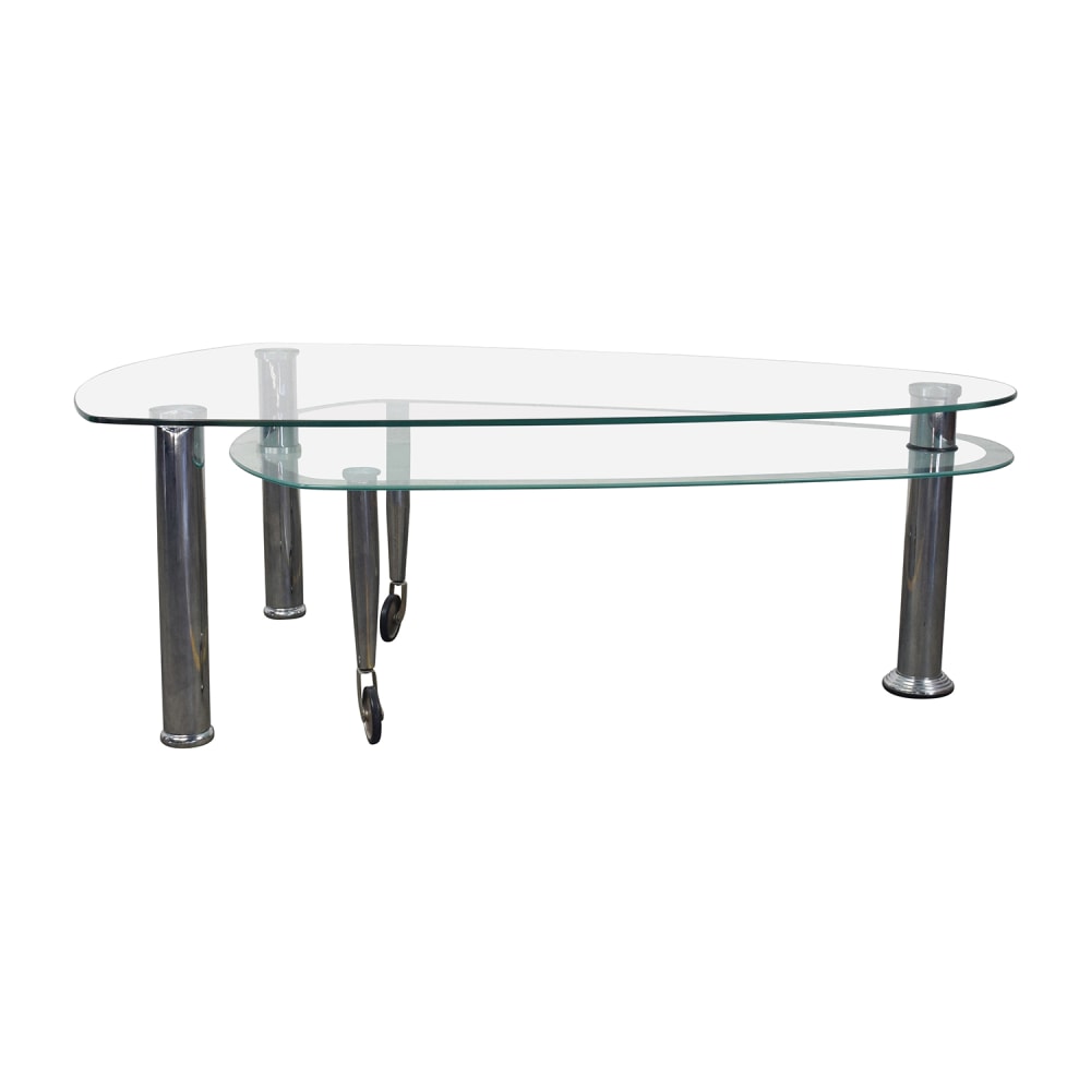 https://res.cloudinary.com/dkqtxtobb/image/upload/f_auto,q_auto:best,w_1000/product-assets/20749/shop/tables/coffee-tables/used-triangular-rounded-glass-and-chrome-table.jpeg