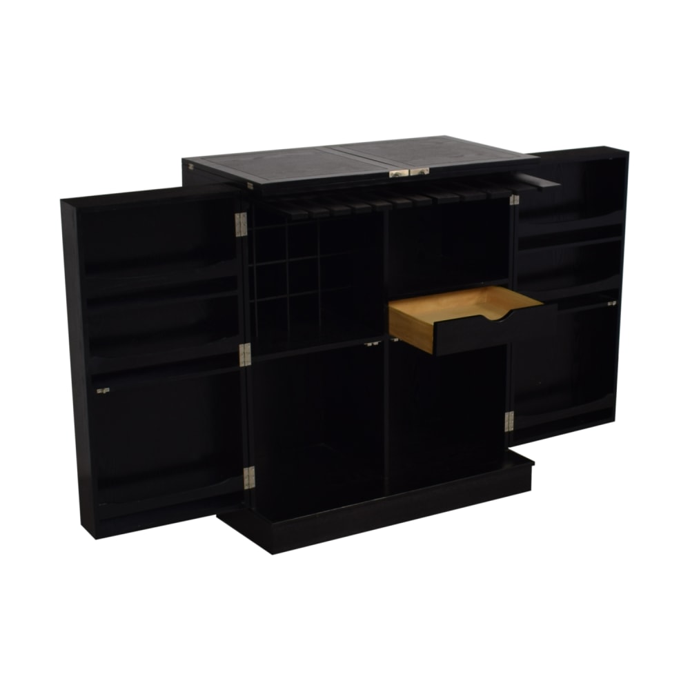 https://res.cloudinary.com/dkqtxtobb/image/upload/f_auto,q_auto:best,w_1000/product-assets/82336/crate-and-barrel/storage/cabinets-sideboards/second-hand-crate-and-barrel-steamer-bar-cabinet.jpeg