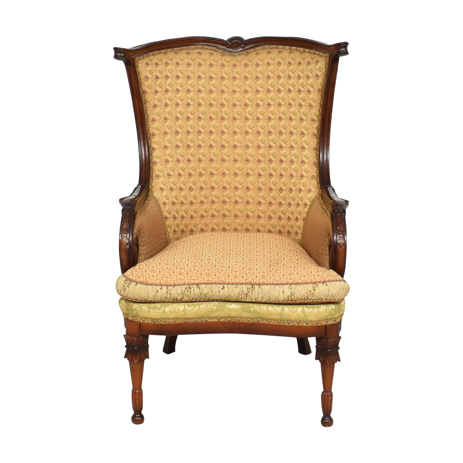Antique French Louis XV style wingback chair.