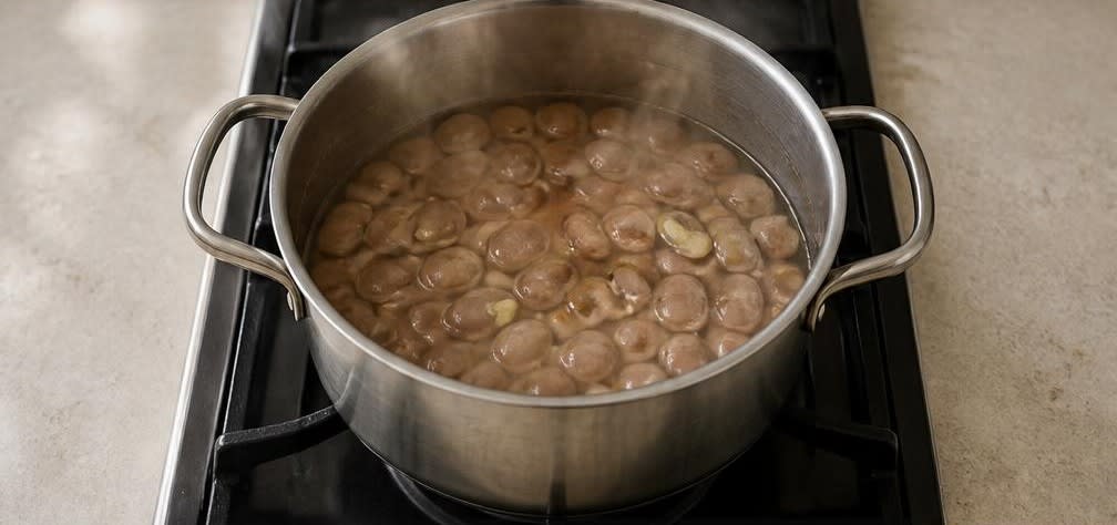 Ägyptisches Ful Medames mit Zitrone und Kreuzkümmel – Zubereitung Schritt für Schritt – Bohnen erwärmen