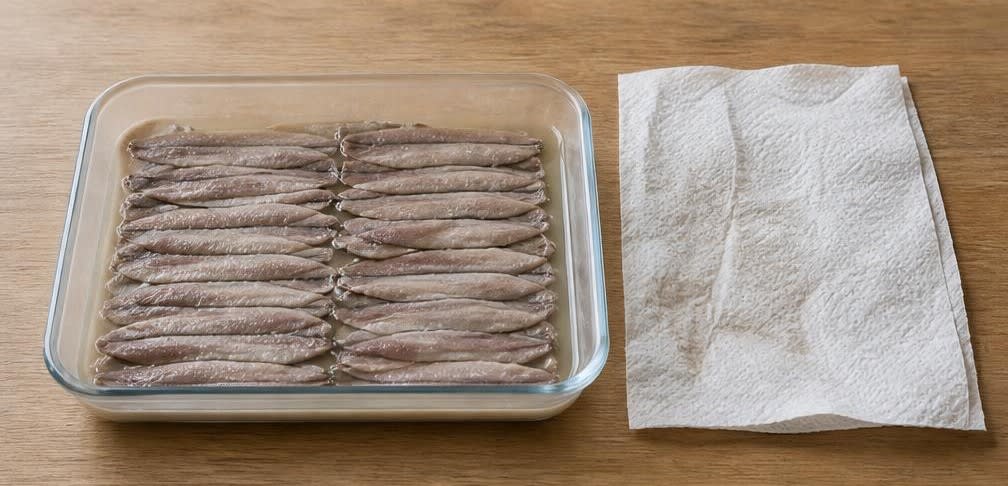 Spanische Boquerones en Vinagre – Zubereitung Schritt für Schritt – Essig abgießen