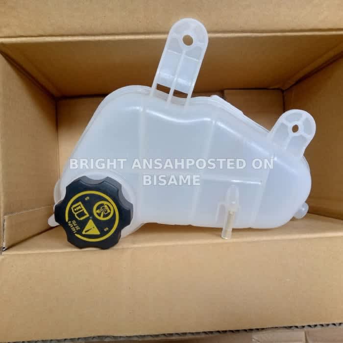 Chevrolet Sonic Replacement coolant reservoir expansion tank with a cap 