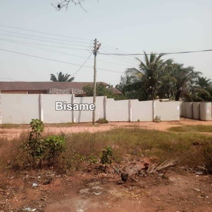 REGISTERED TITLE ONE PLOT OF LAND AT POKUASI ODUMASE OPPOSITE THE ODUMASI MARKET.