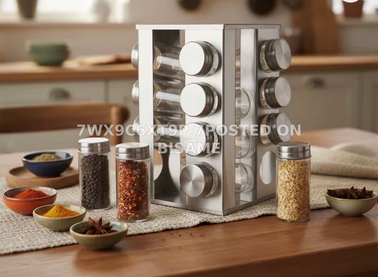 Stainless steel rotating spice rack carousel with 16 glass jars