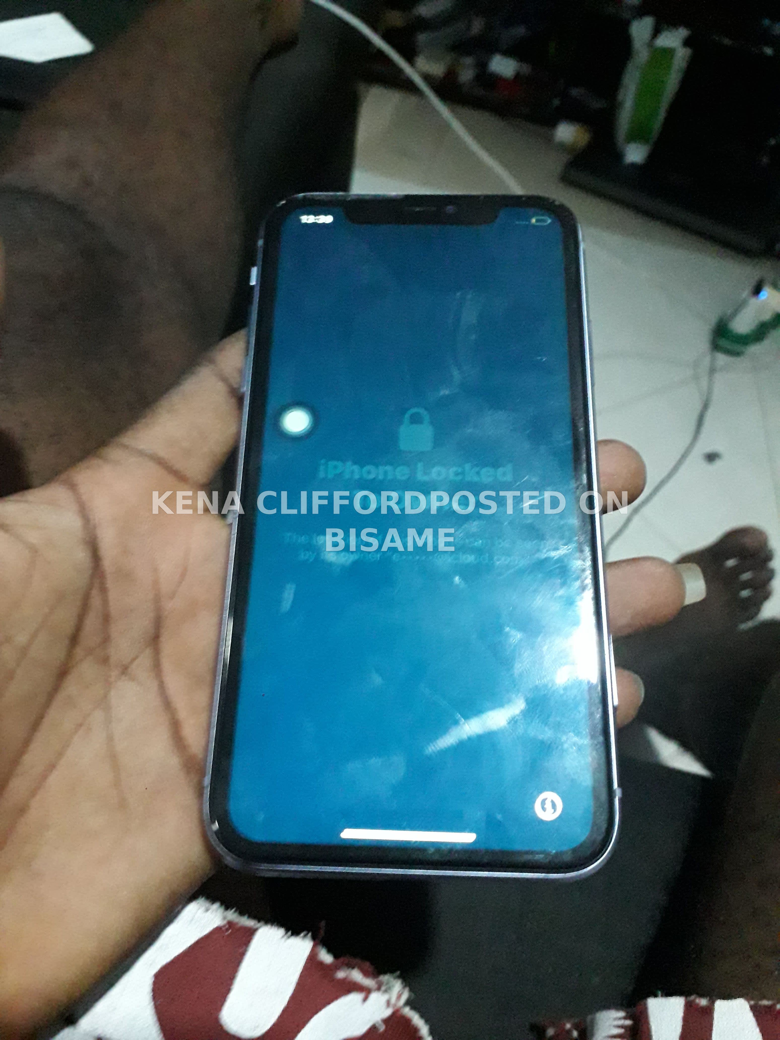 Locked Apple iPhone 11 with a cracked back glass, 4GB Ram, 64GB, Used
